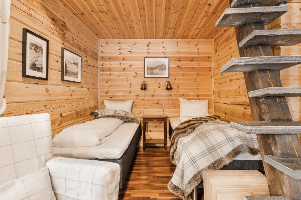 Postel nebo postele na pokoji v ubytování Namsentunet