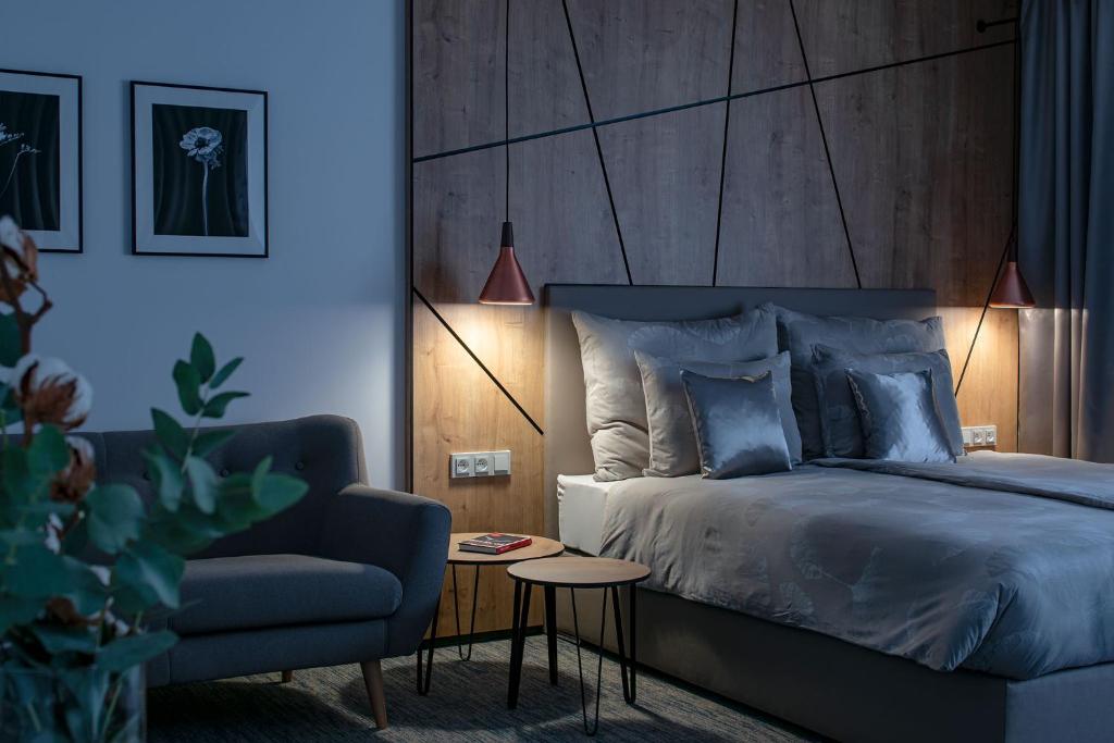 Postel nebo postele na pokoji v ubytování Hotel Osvit