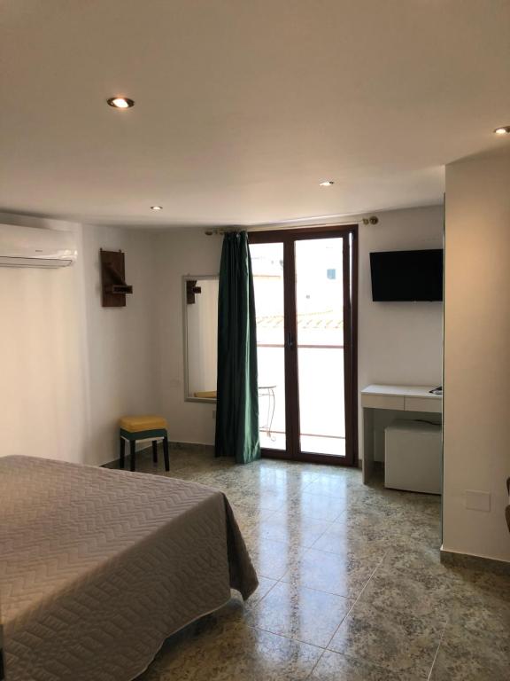Postel nebo postele na pokoji v ubytování B&B Teta Vieste