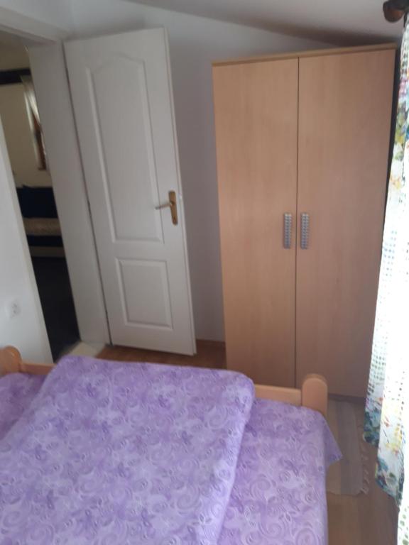 Postel nebo postele na pokoji v ubytování Kolibica