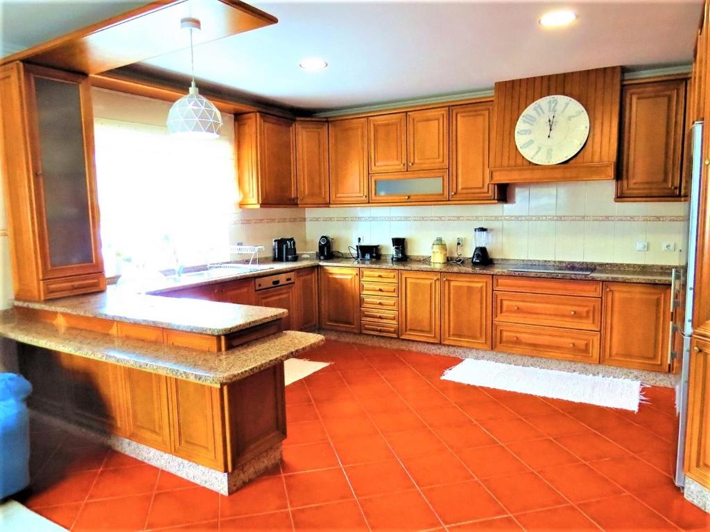 Kuchyň nebo kuchyňský kout v ubytování Anjos’home