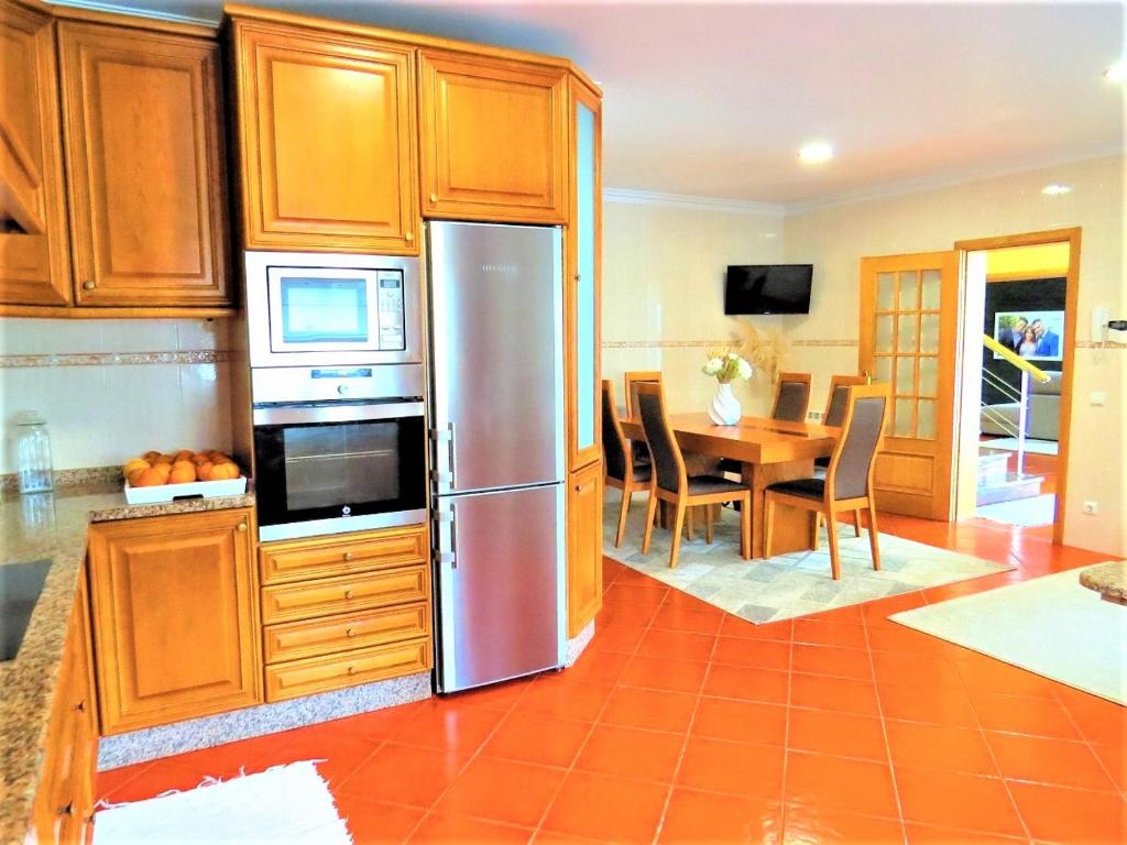 Kuchyň nebo kuchyňský kout v ubytování Anjos’home