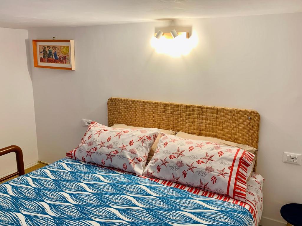 Giường trong phòng chung tại Maelle Trastevere