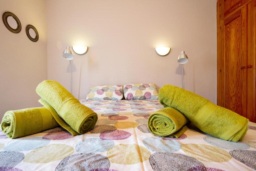 Postel nebo postele na pokoji v ubytování Casa Raquel 2
