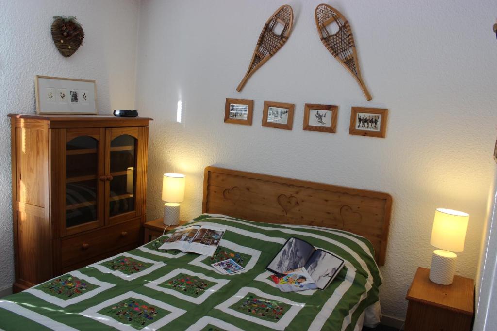 Postel nebo postele na pokoji v ubytování Trois Vallées Appartements VTI