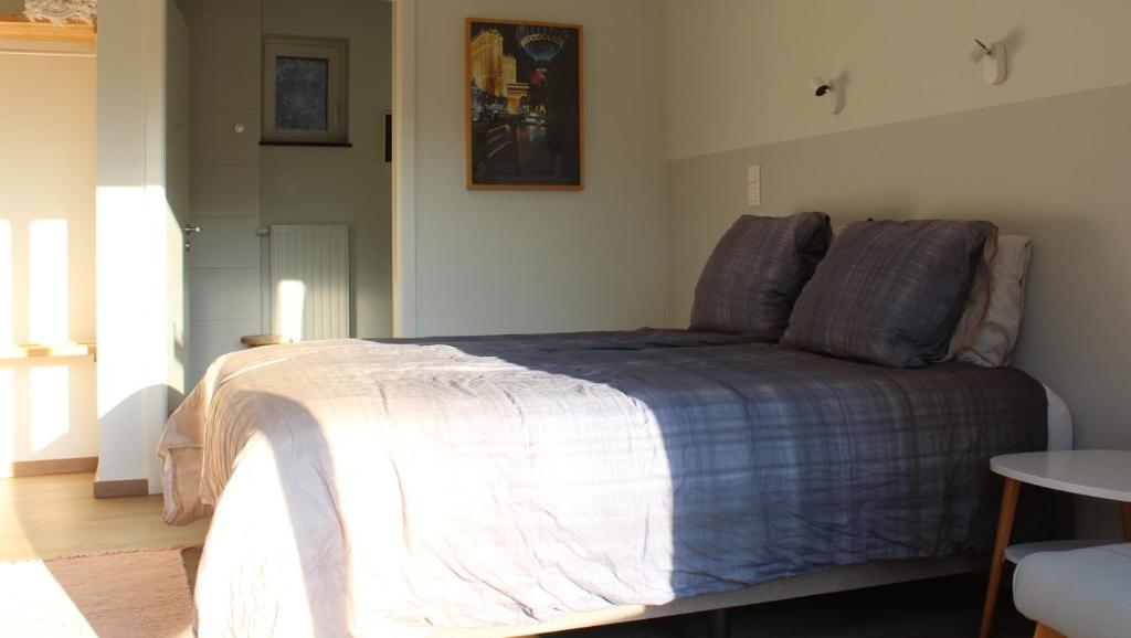Postel nebo postele na pokoji v ubytování B&B Les Lits de Nohaipré