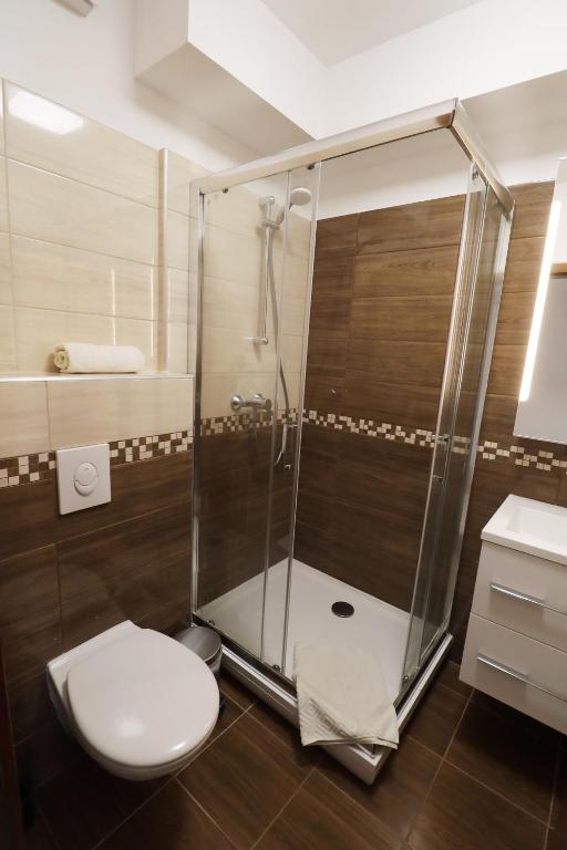 Koupelna v ubytování Galerius Golden Beach Apartment
