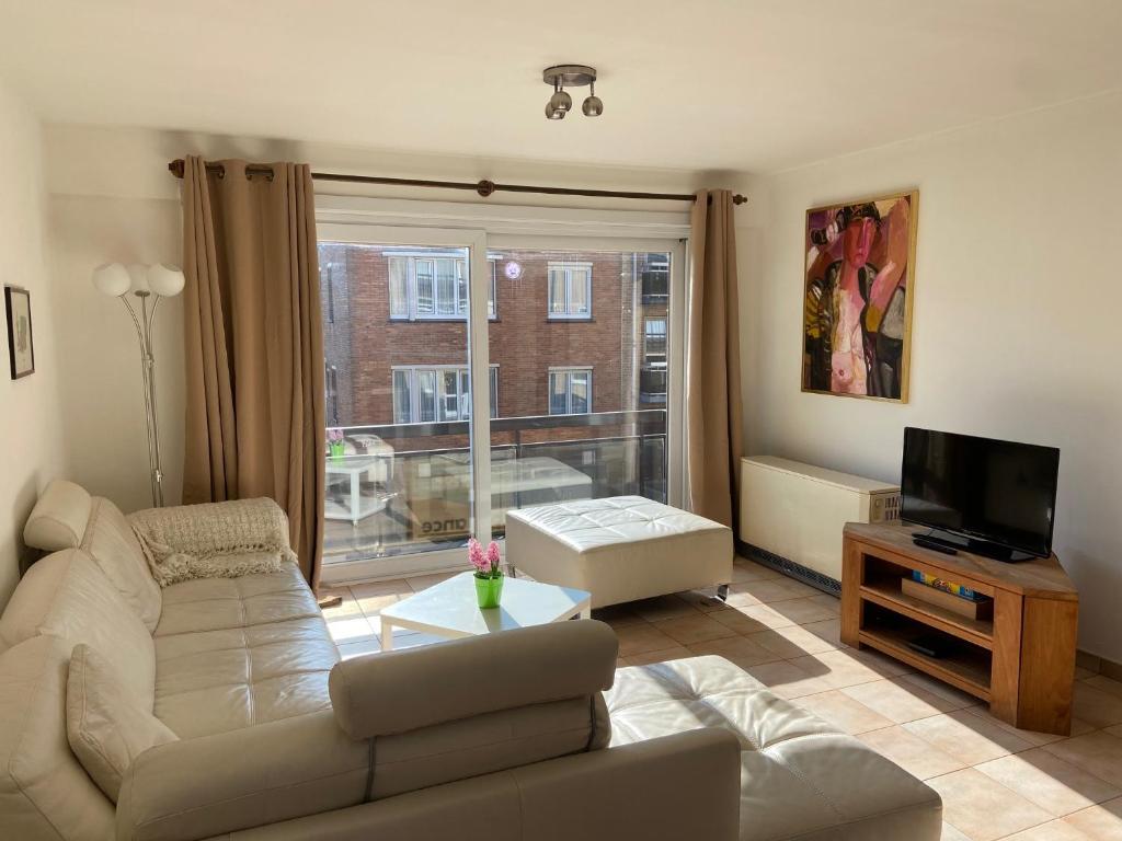 Ruim zonnig appartement op 50m van strand - Housity