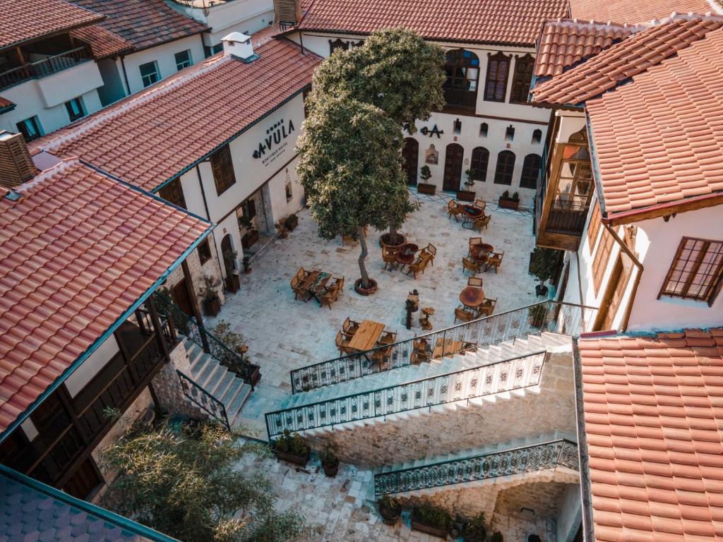 an overhead view of a courtyard in a town with buildings at Konak Avula Boutique Hotel in Hatay