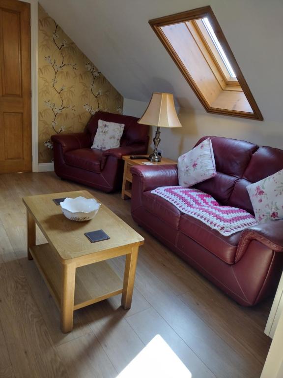 Een zitgedeelte bij Ivydene Cottage