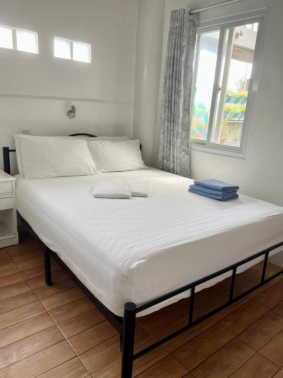 Postel nebo postele na pokoji v ubytování Balai Tinay Guesthouse