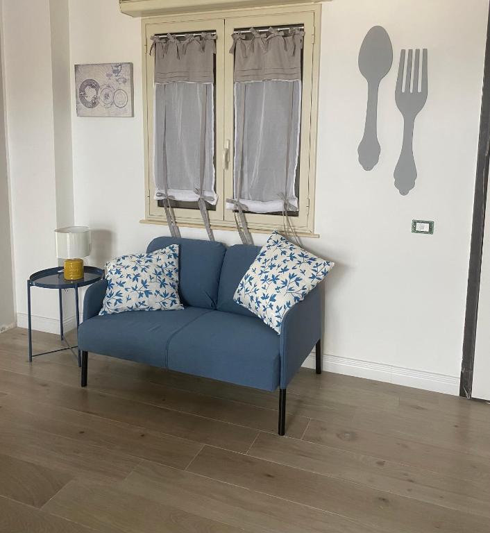 A seating area at Tra mare e lago
