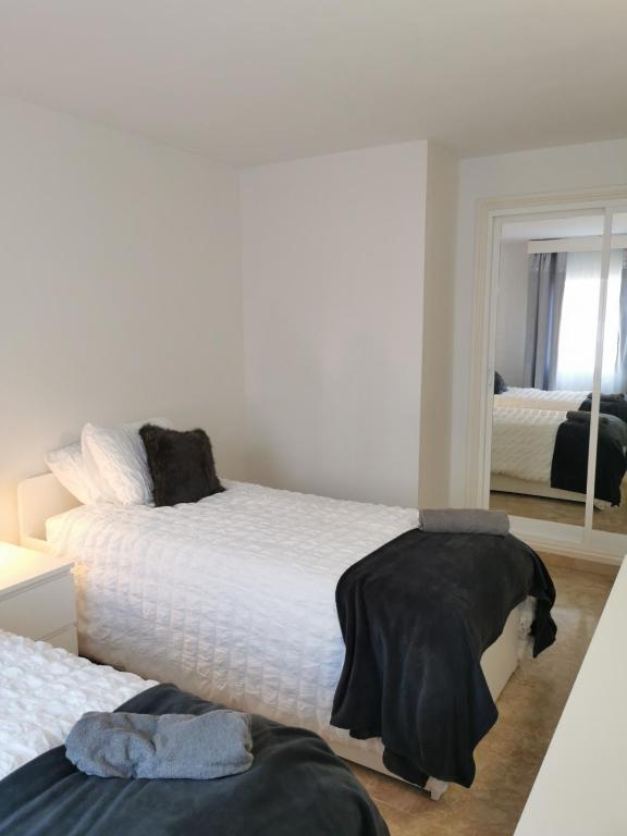 Posteľ alebo postele v izbe v ubytovaní 7 Ocean Point