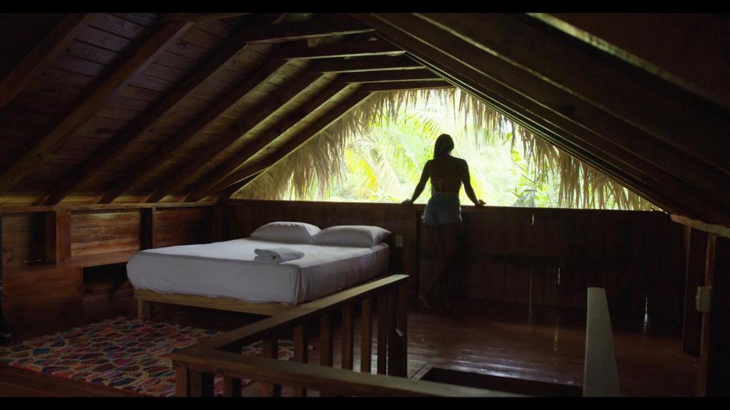 Postel nebo postele na pokoji v ubytování Aventura Rincon Ecolodge