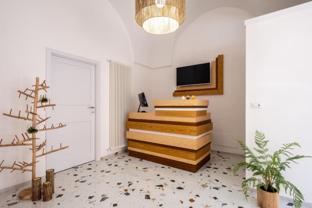 TV a/nebo společenská místnost v ubytování La Bella Ostuni Suites