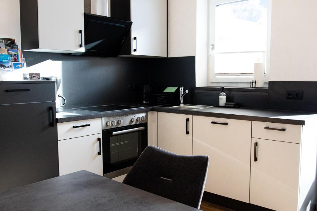 Kuchyň nebo kuchyňský kout v ubytování Apartment Pult