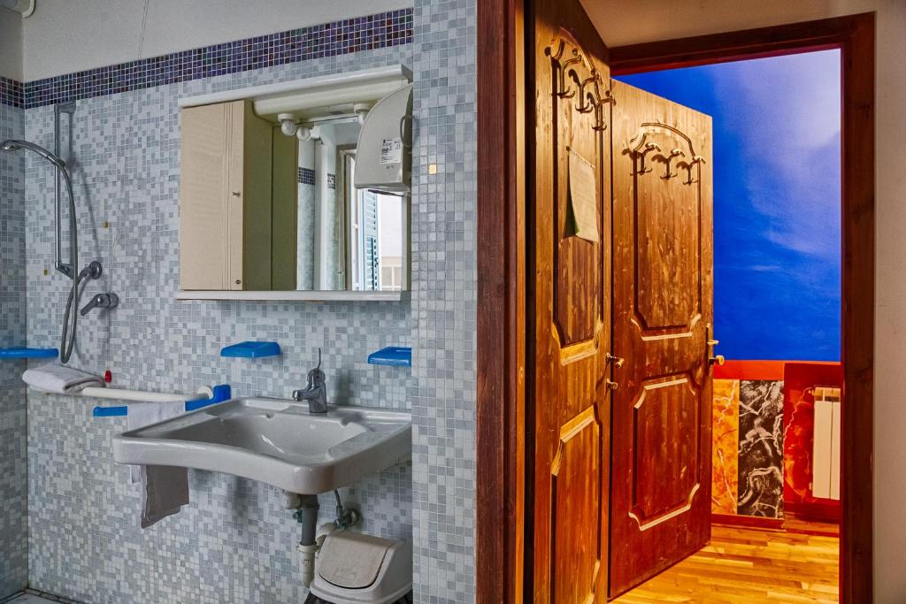 Koupelna v ubytování Hotel Portacavana