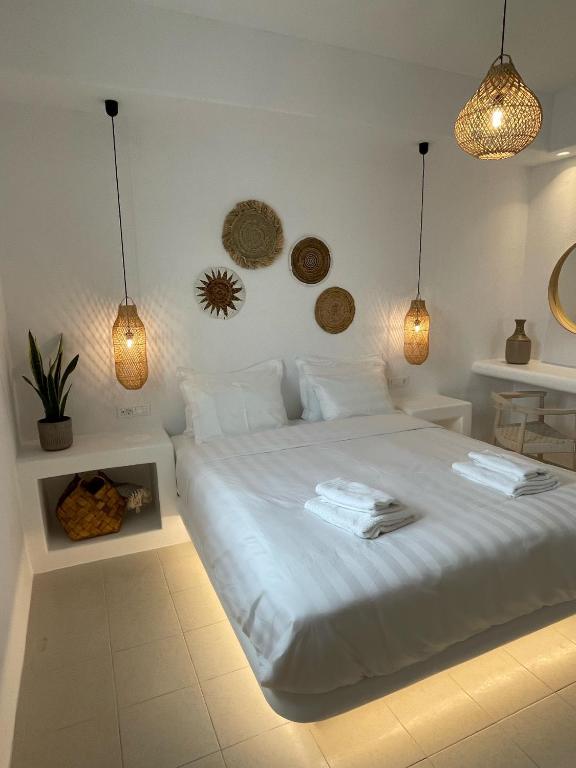Posteľ alebo postele v izbe v ubytovaní Quattro Venti Suites Mykonos