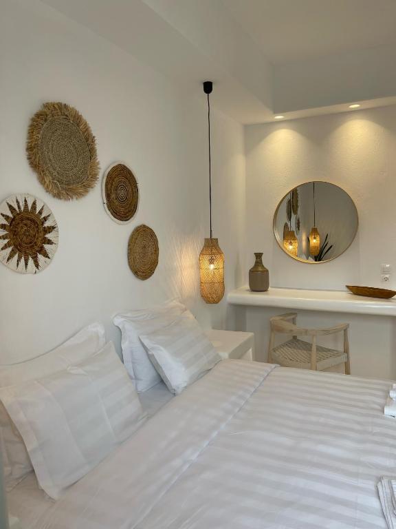 Posteľ alebo postele v izbe v ubytovaní Quattro Venti Suites Mykonos