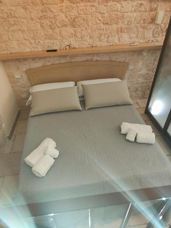 Posteľ alebo postele v izbe v ubytovaní Il Balcone di Anna - Luxury Homes