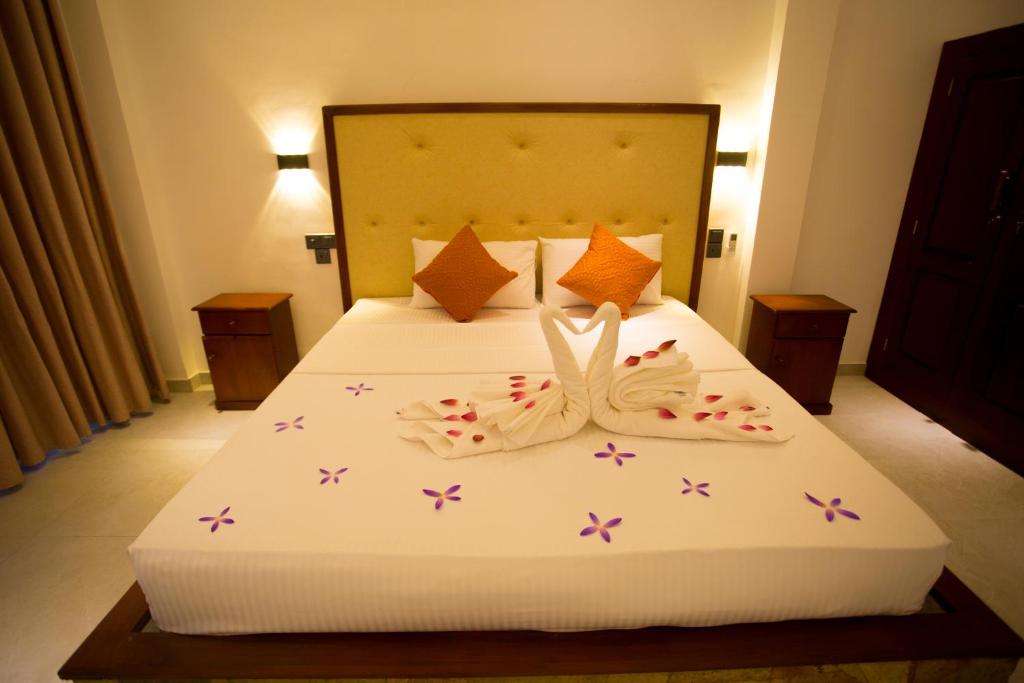Postel nebo postele na pokoji v ubytování Lena Resort