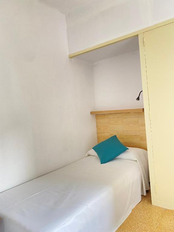 Postel nebo postele na pokoji v ubytování Atico con Terraza