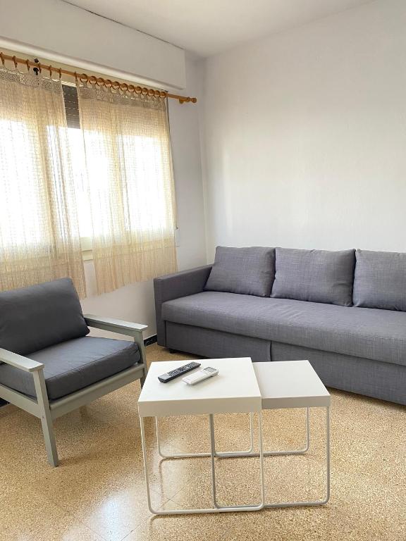 Posezení v ubytování Atico con Terraza