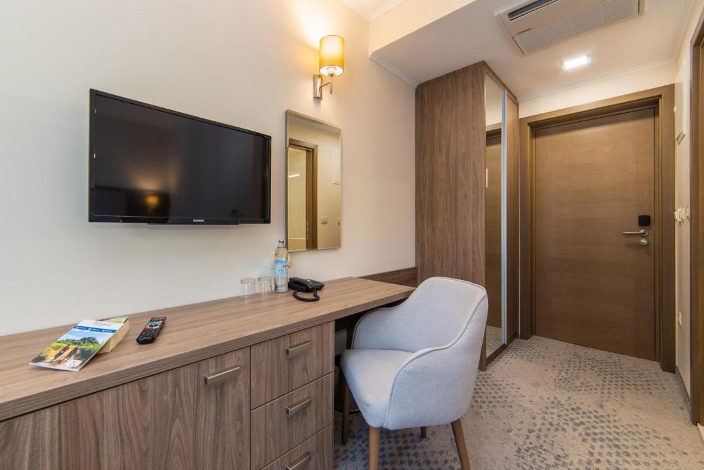 TV a/nebo společenská místnost v ubytování Hotel Bella Vista