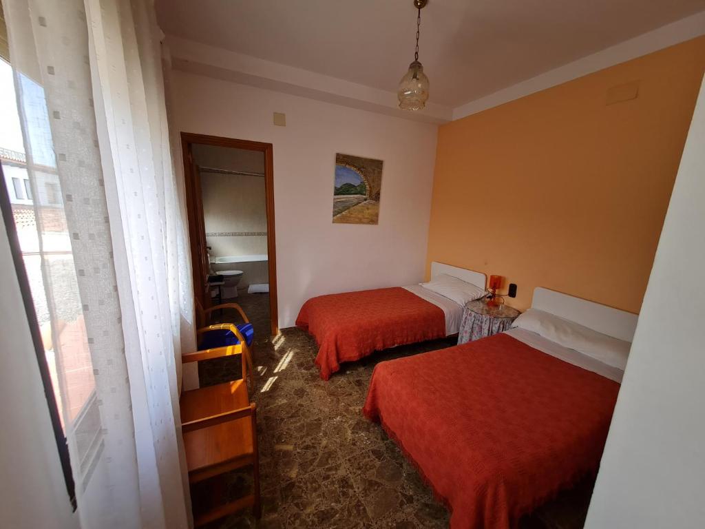 Postel nebo postele na pokoji v ubytování Hotel Bon Lloc