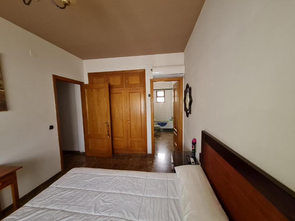 Postel nebo postele na pokoji v ubytování Hotel Bon Lloc