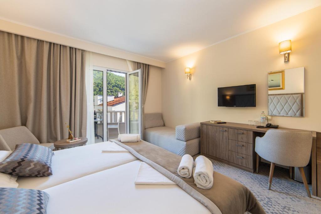 Postel nebo postele na pokoji v ubytování Hotel Bella Vista