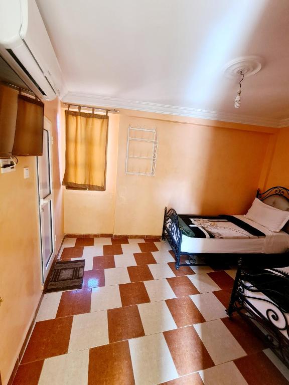 Postel nebo postele na pokoji v ubytování Hotel salem leksor