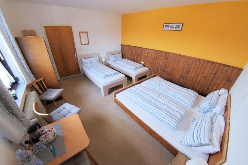 Postel nebo postele na pokoji v ubytování Haus Tapestry