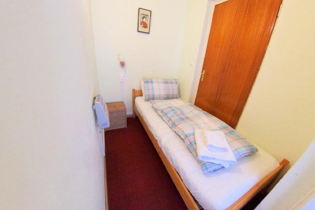 Postel nebo postele na pokoji v ubytování Haus Tapestry