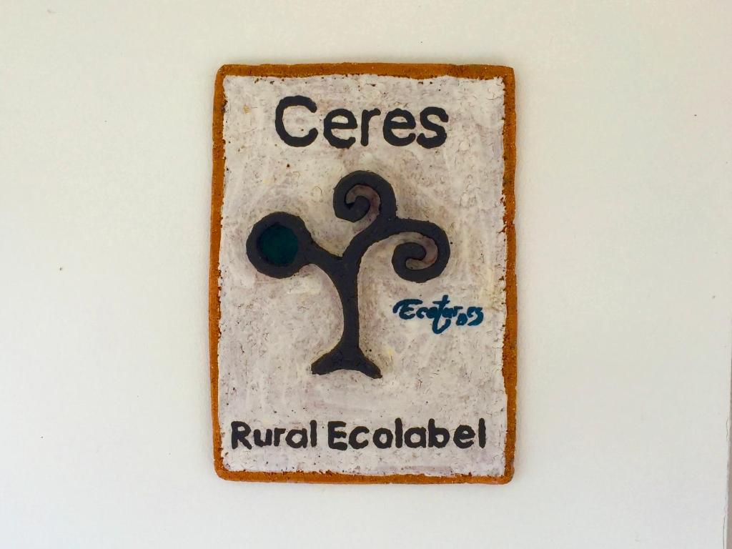 a sign that reads cares renal ecologist at el gran sueño Boutique Hotel & Apartamentos - Adults Only in Pintueles