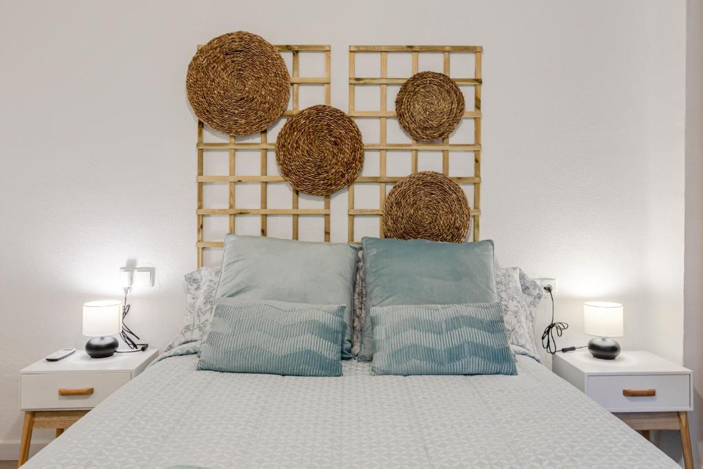 Кровать или кровати в номере Avanti La Judería, vive Sevilla con los cinco sentidos