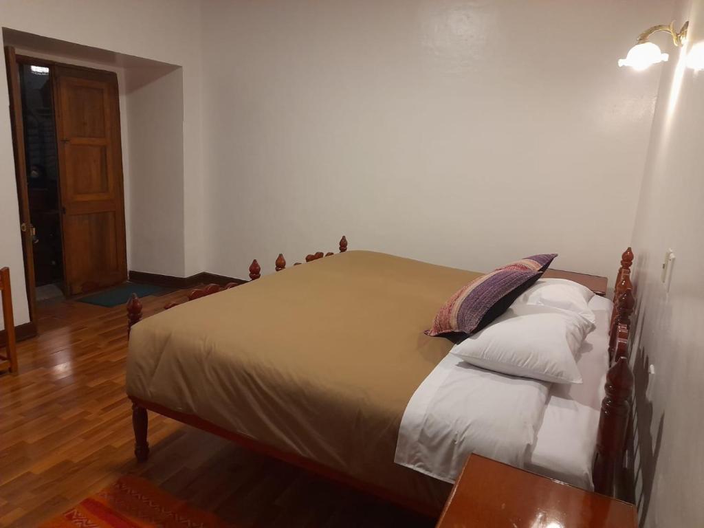 Voodi või voodid majutusasutuse Terra Sagrada Cusco toas