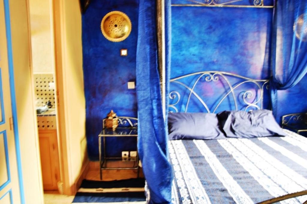 Postel nebo postele na pokoji v ubytování Riad Anma