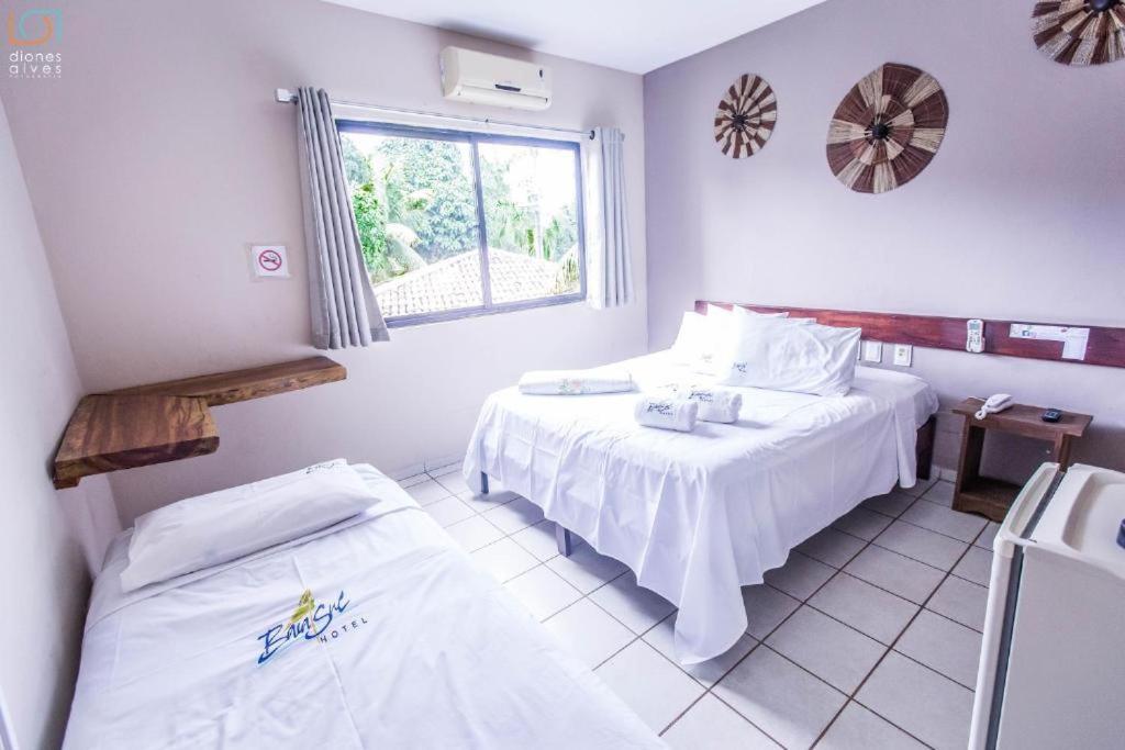 Cama o camas de una habitación en Baía Sul Hotel