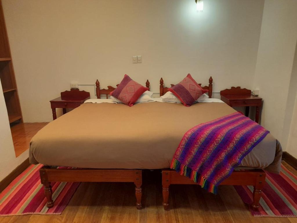 Ένα ή περισσότερα κρεβάτια σε δωμάτιο στο Terra Sagrada Cusco