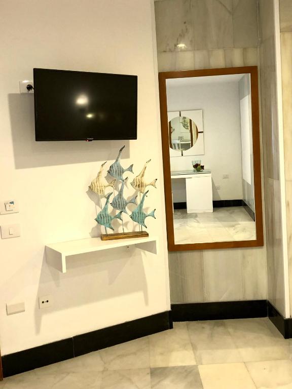 TV a/nebo společenská místnost v ubytování Hotel Océano Centro