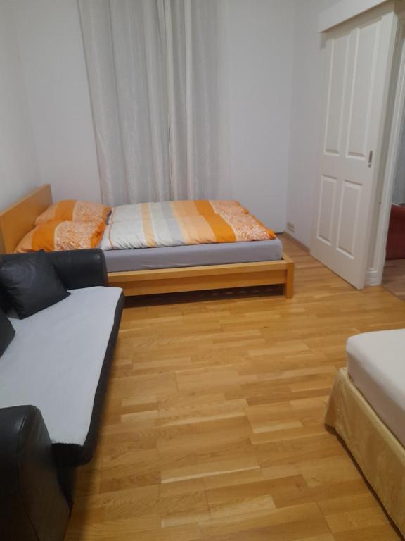 Posteľ alebo postele v izbe v ubytovaní Ferienwohnung Schloessel 26/18