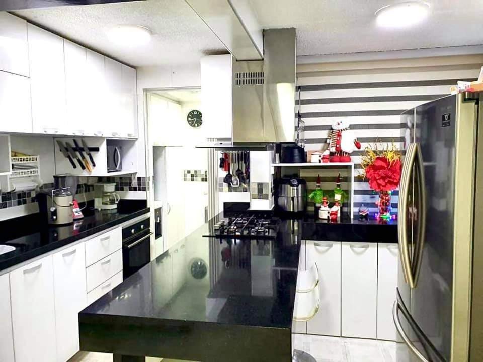 A cozinha ou cozinha compacta de APARTAMENTO MELGAR
