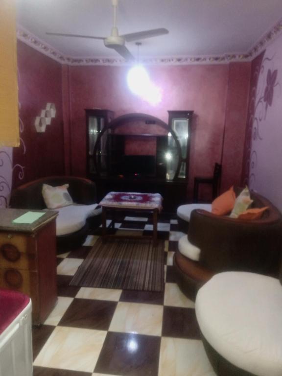 A seating area at App11- BELAL - Enjoy the privacy of staying in a quiet apartment with free Wi-Fi as your complete second home in the heart of Hurghada