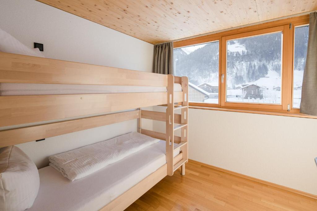 Postel nebo postele na pokoji v ubytování Apartments Susanne