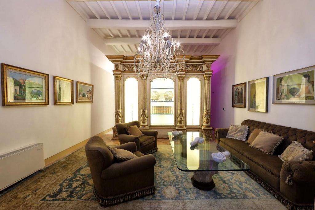 Posezení v ubytování Casa Raiola Ercolano Luxury Rooms & Spa