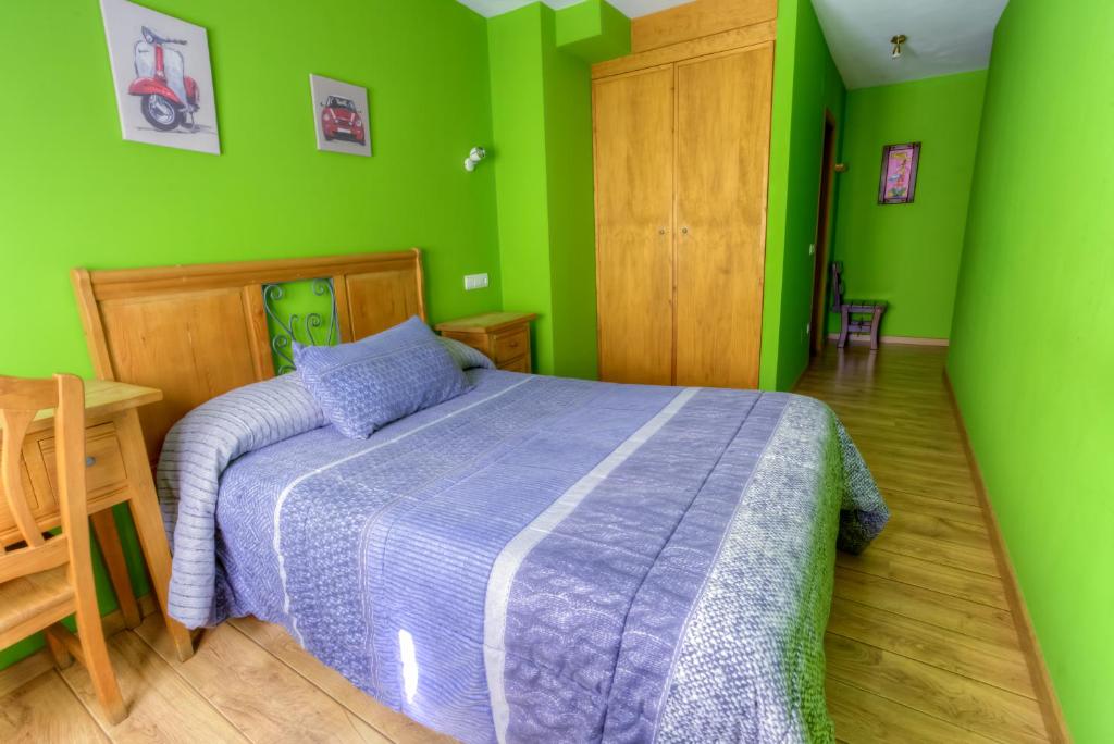 Postel nebo postele na pokoji v ubytování Hostal Rural La Tintoreria