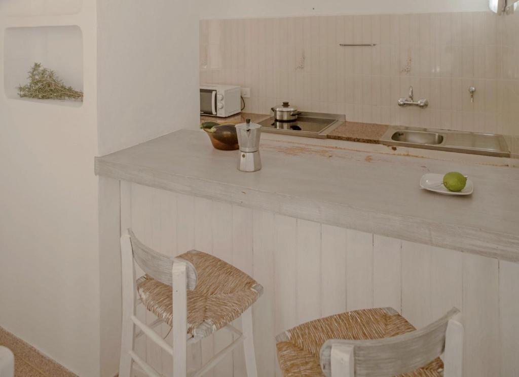 Kuchyň nebo kuchyňský kout v ubytování Viviendas Ferrer - Formentera Break