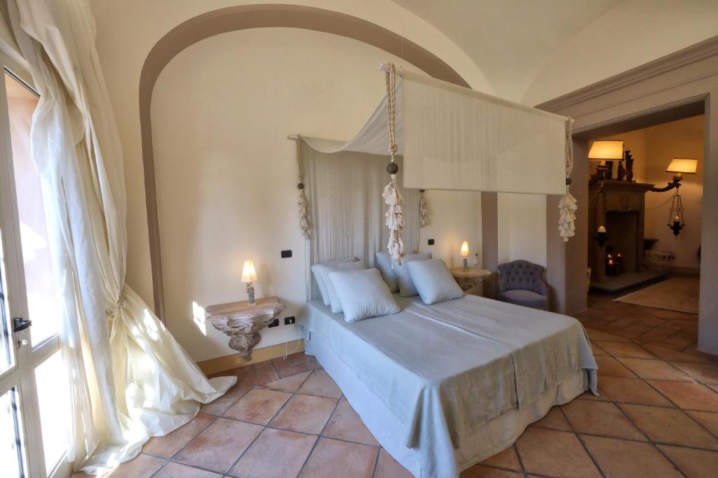 Postel nebo postele na pokoji v ubytování Casa Raiola Ercolano Luxury Rooms & Spa