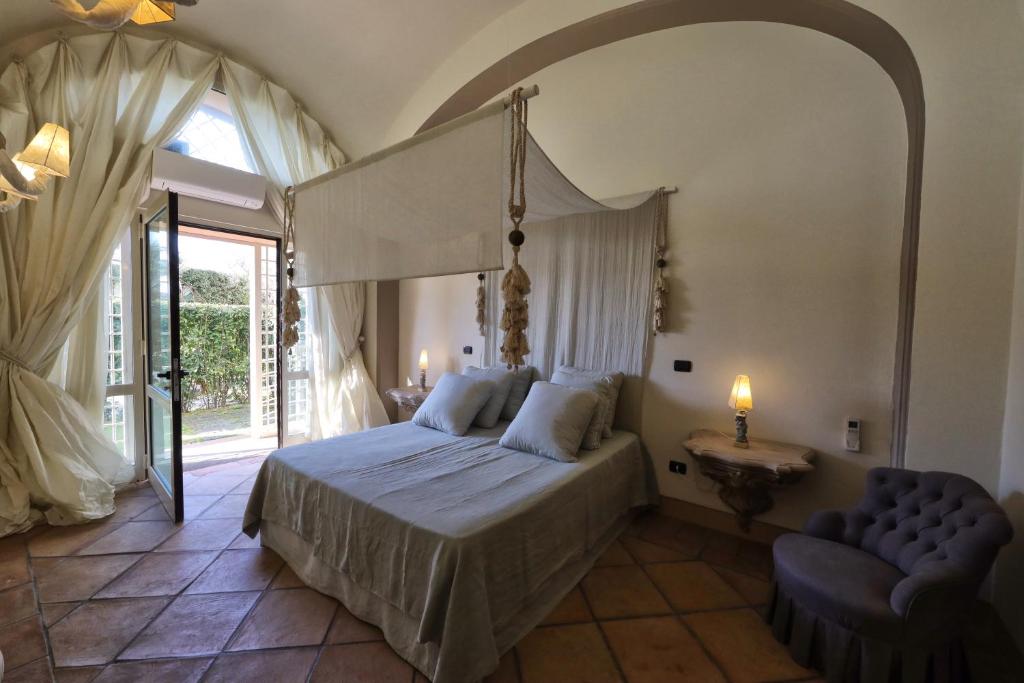 Postel nebo postele na pokoji v ubytování Casa Raiola Ercolano Luxury Rooms & Spa